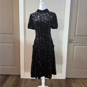 Collectif Black Dress with Purple Halloween/ witchy pattern.